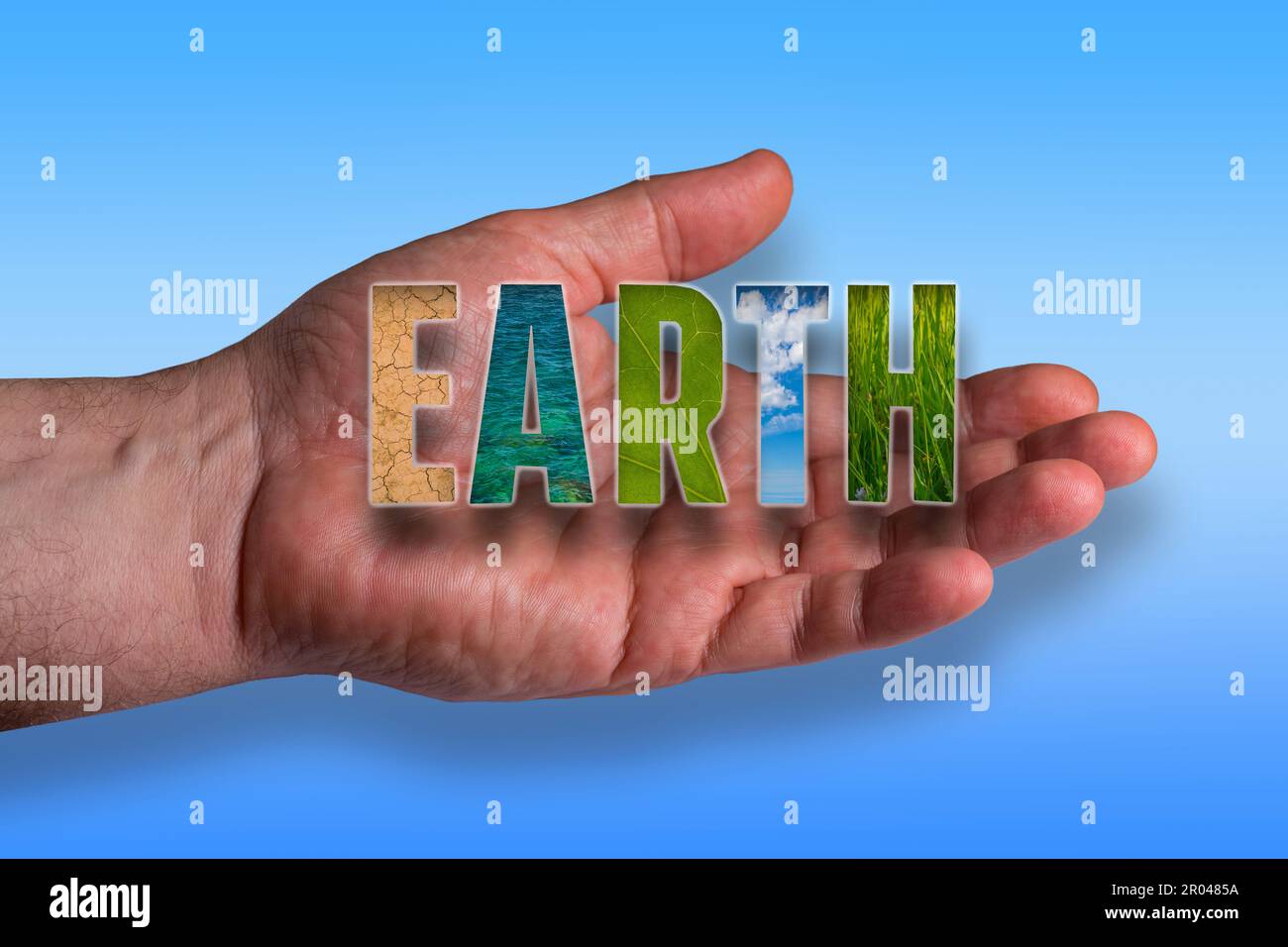 Open male hand, word Earth filled with images of desert, sea, leaf texture, sky with clouds and grass. Light blue gradient background Stock Photo