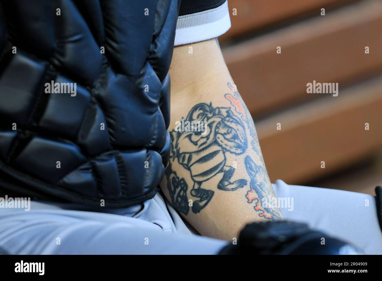 A tattoo is seen on Chicago White Sox Yoan Moncada's neck during