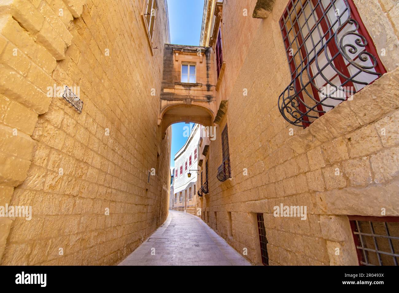 A view of old Mdina street with a traditional Maltese style openwork