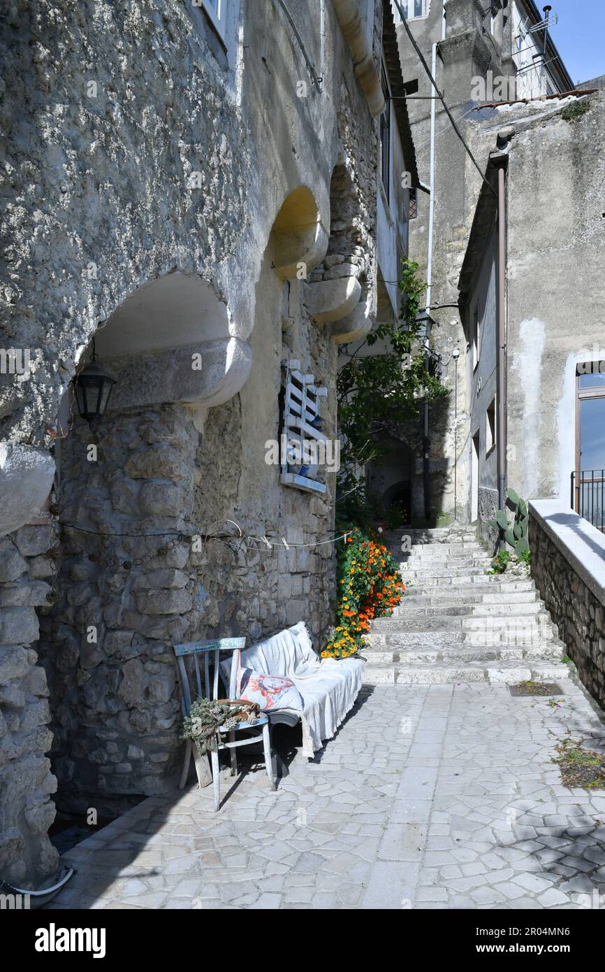 A narrow street among the old houses of Guardia Sanframondi, a small