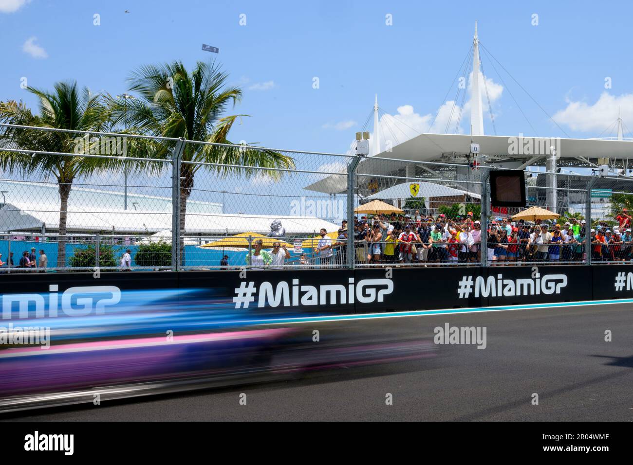 6th May 2023 Miami International Autodrome, Miami Gardens, Florida, USA Formula 1 Crypto Miami Grand Prix 2023 Qualifying Day Fans watch an F1 car speed by on the track during FP3 session
