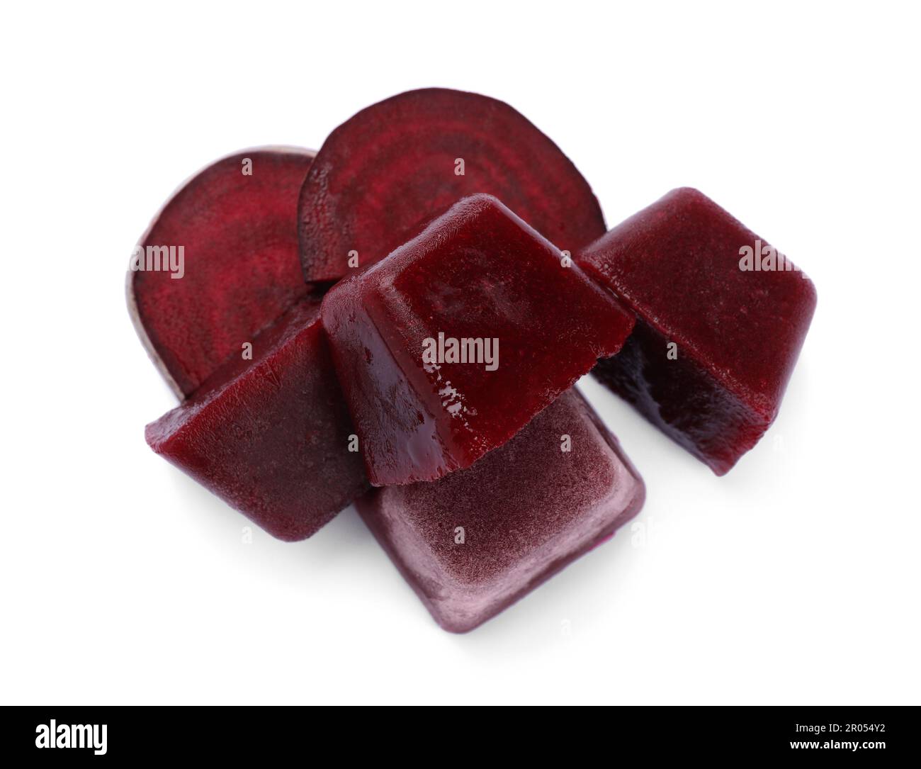 Frozen beetroot puree cubes and fresh beetroot isolated on white, top view Stock Photo