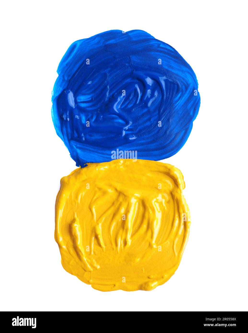 Yellow and blue paint circles drawn with brush on white background, top view Stock Photo
