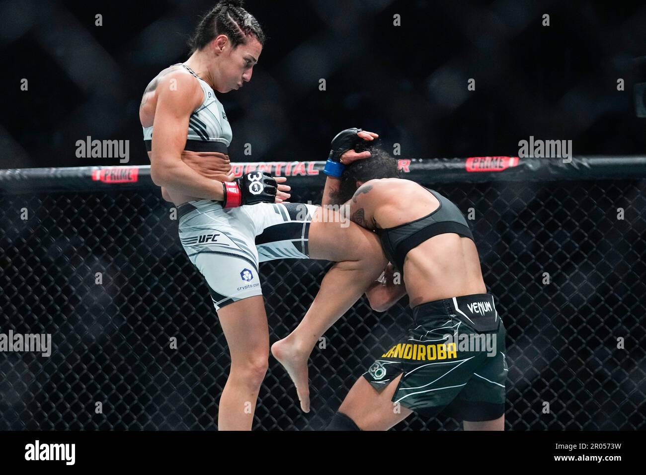 Brazil's Marina Rodriguez, left, kicks Brazil's Virna Jandiroba during