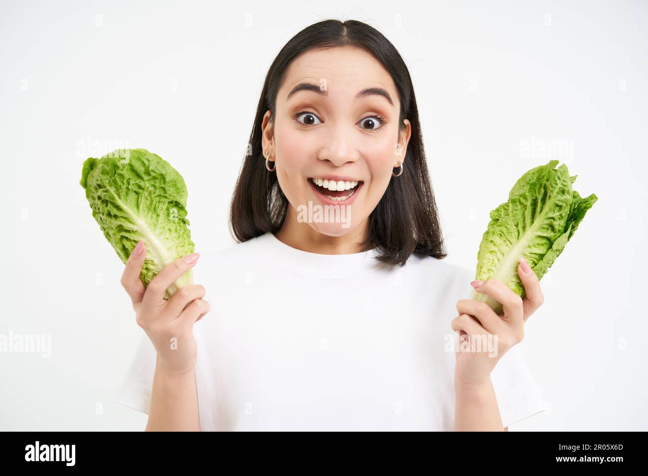 Healthy Woman Cleansing Diets Reference: Healthy Diet And Organic Food Smiling Asian Woman Showing Cabbage