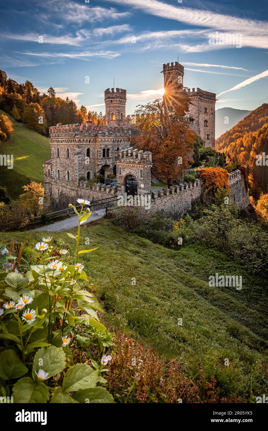 Latzfons, Italy - Beautiful autumn scenery at Gernstein Castle (Castello di Gernstein, Schloss Gernstein) at sunrise in South Tyrol with blue sky Stock Photo