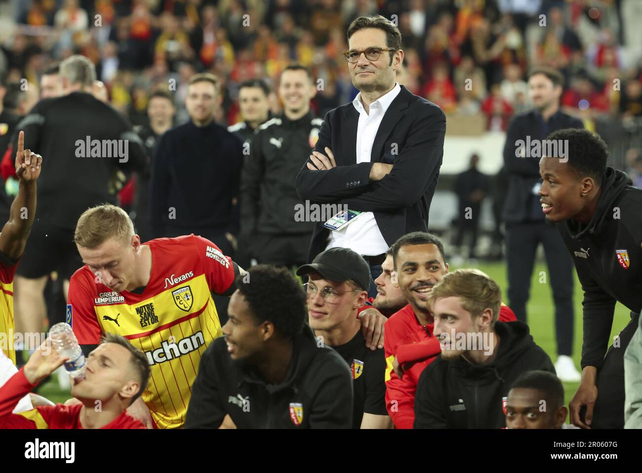 Owner of RC Lens Joseph Oughourlian celebrates the victory with the players  following the French championship Ligue 1 football match between RC Lens  (RCL) and Olympique de Marseille (OM) on May 6,