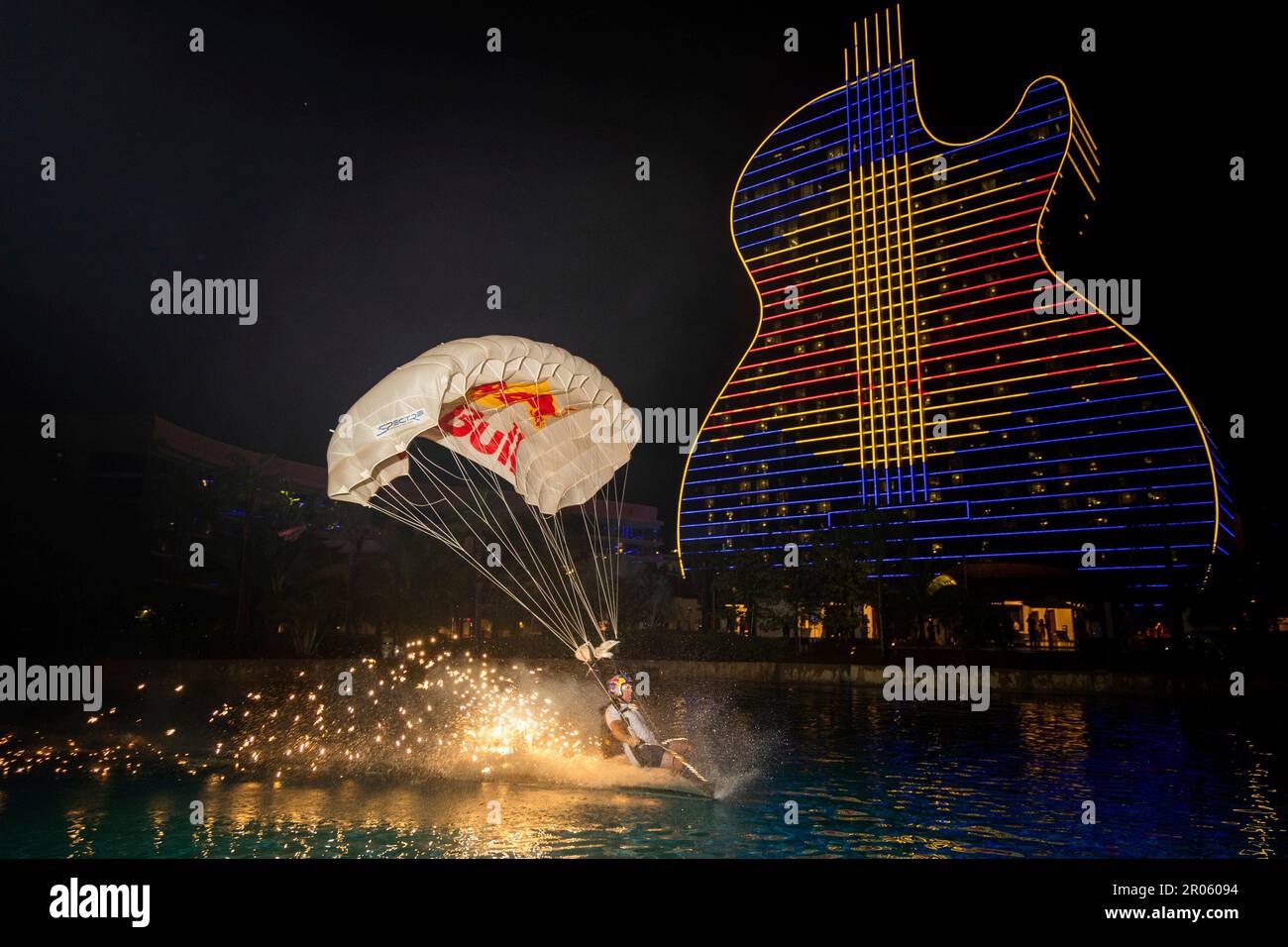 IMAGE DISTRIBUTED FOR HARD ROCK INTERNATIONAL - A Red Bull Air Force Team  member makes a splash in front of the iconic Guitar Hotel at Seminole Hard  Rock Hotel & Casino during
