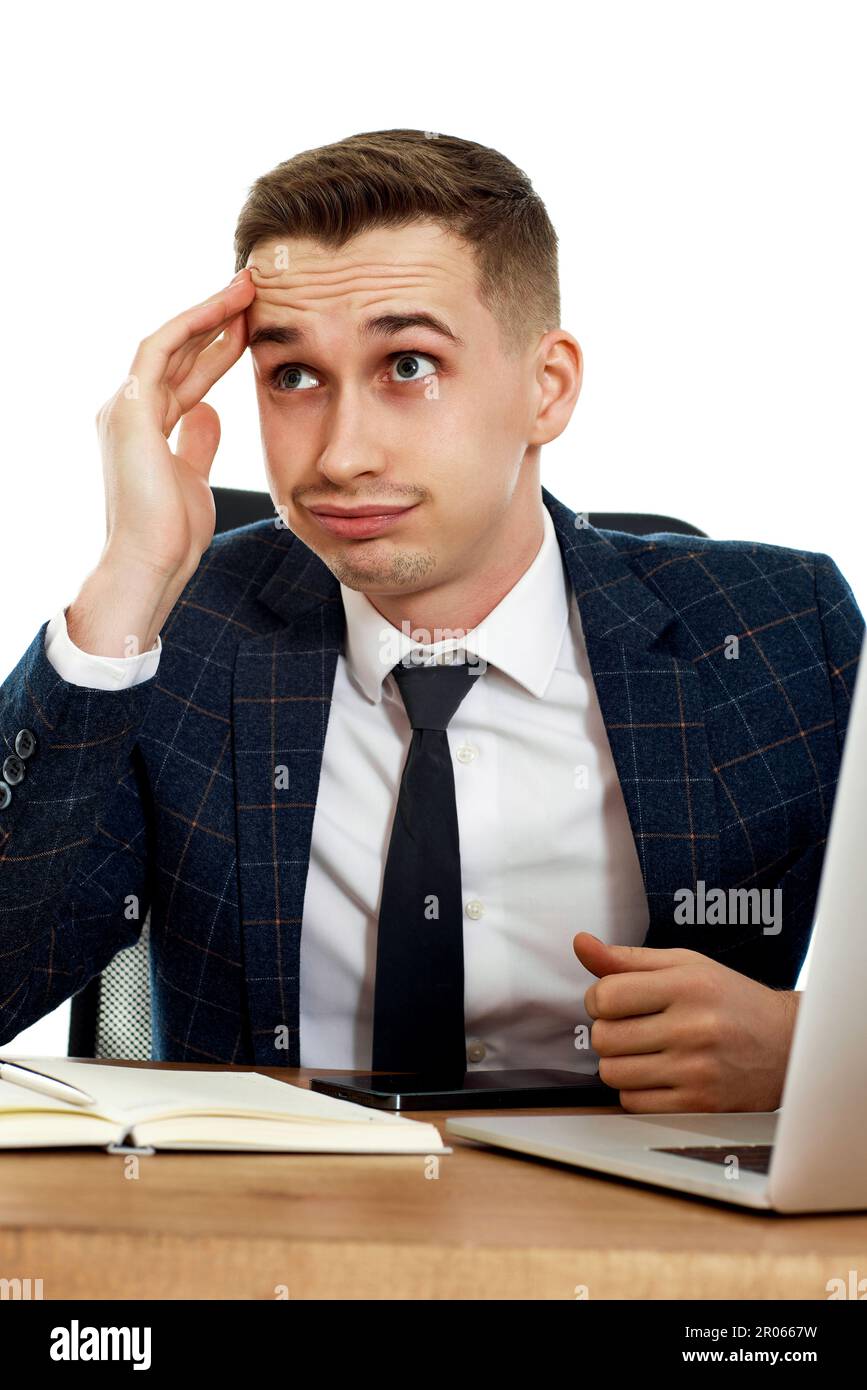 businessman using laptop having problems thinking about troubles Stock Photo