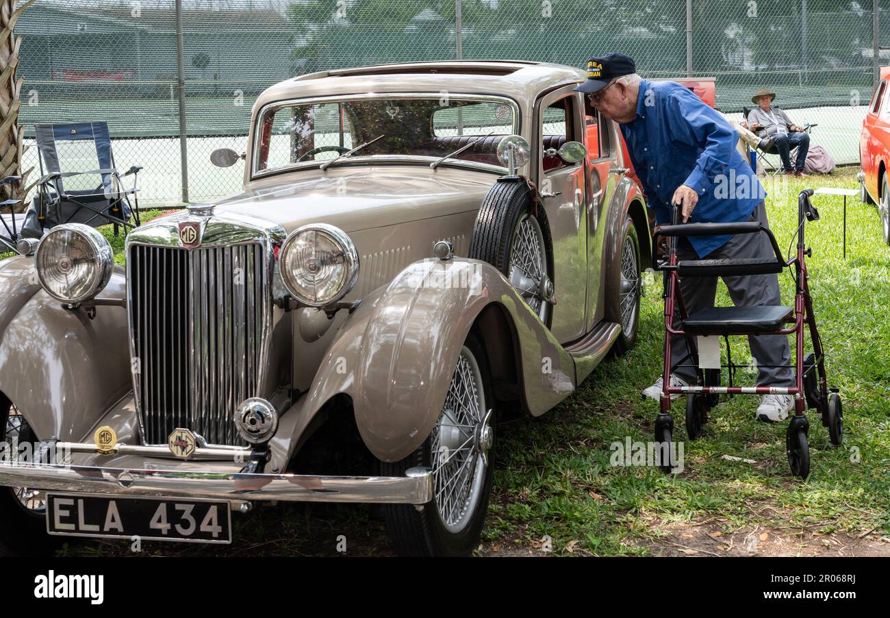 Seabrook, USA. 6th May, 2023. A man looks closely at an antique car at