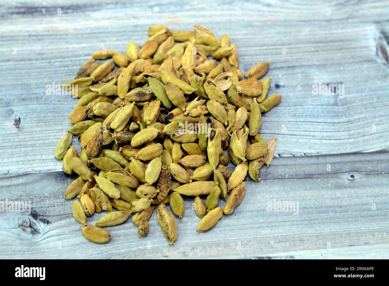 Cardamom, cardamon or cardamum, a spice made from the seeds of several plants in the genera Elettaria and Amomum in the family Zingiberaceae, used in Stock Photo