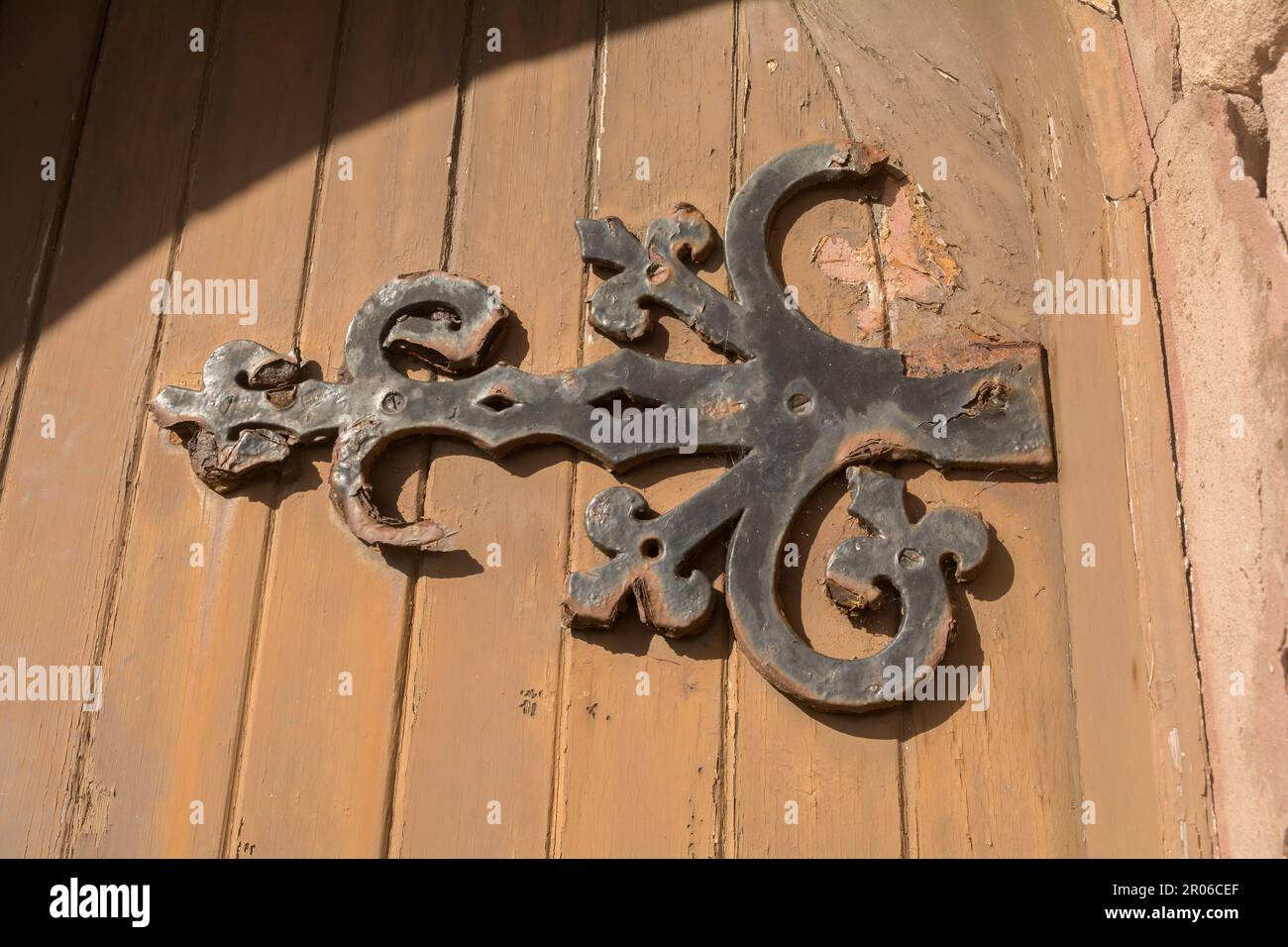 Large church door hinge with texture from corrosion Stock Photo