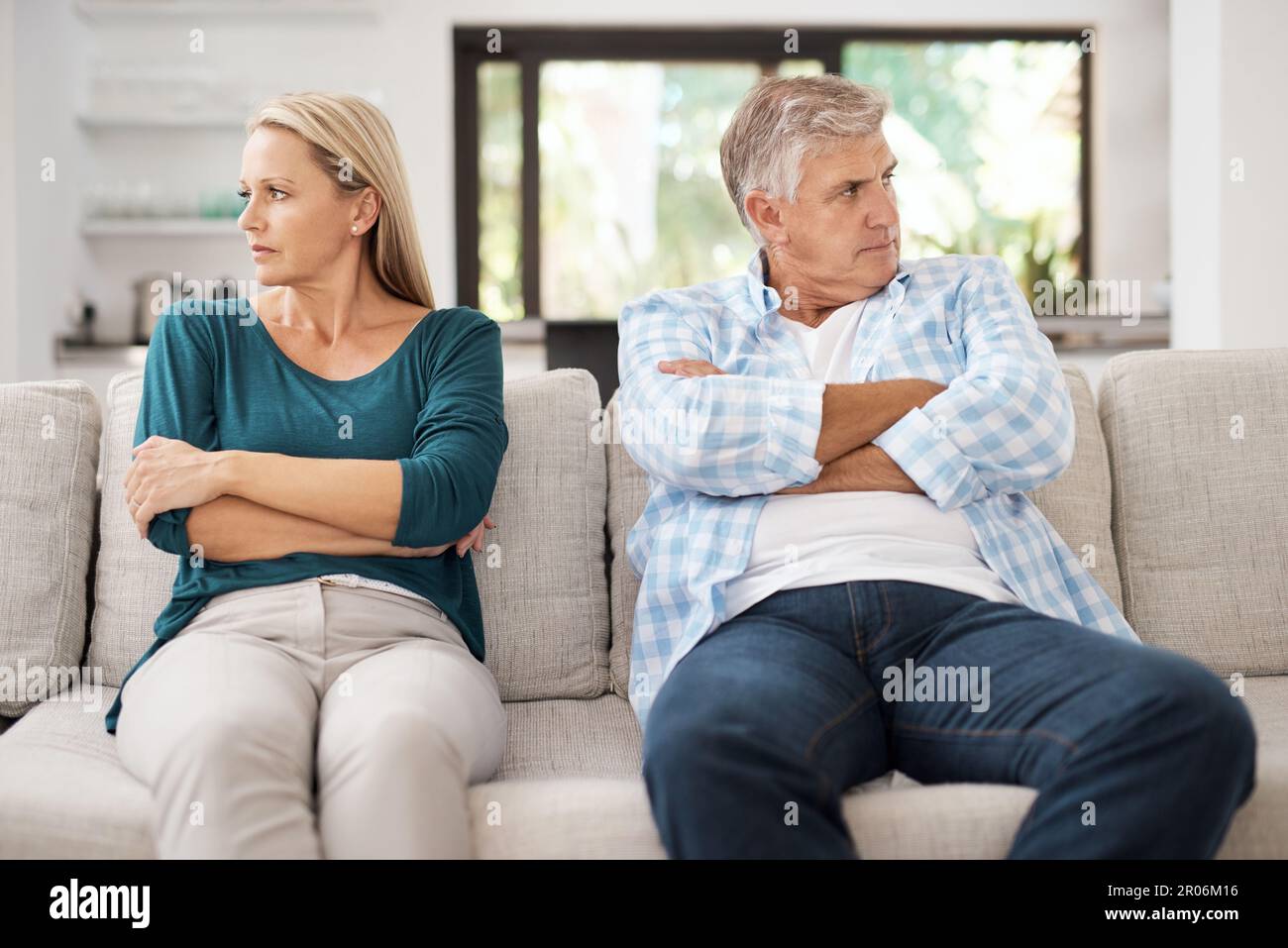 Theyre not on speaking terms at the moment. a mature couple looking ...