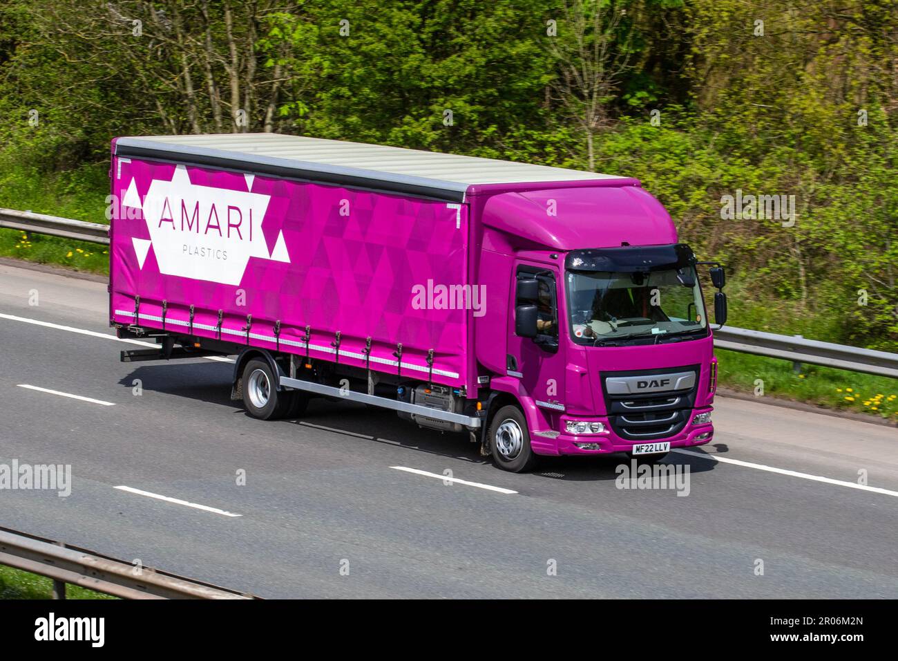 AMARI Plastics, Vink UK Limited. DAF curtain-side lorry travelling on the M61 motorway, UK Stock Photo