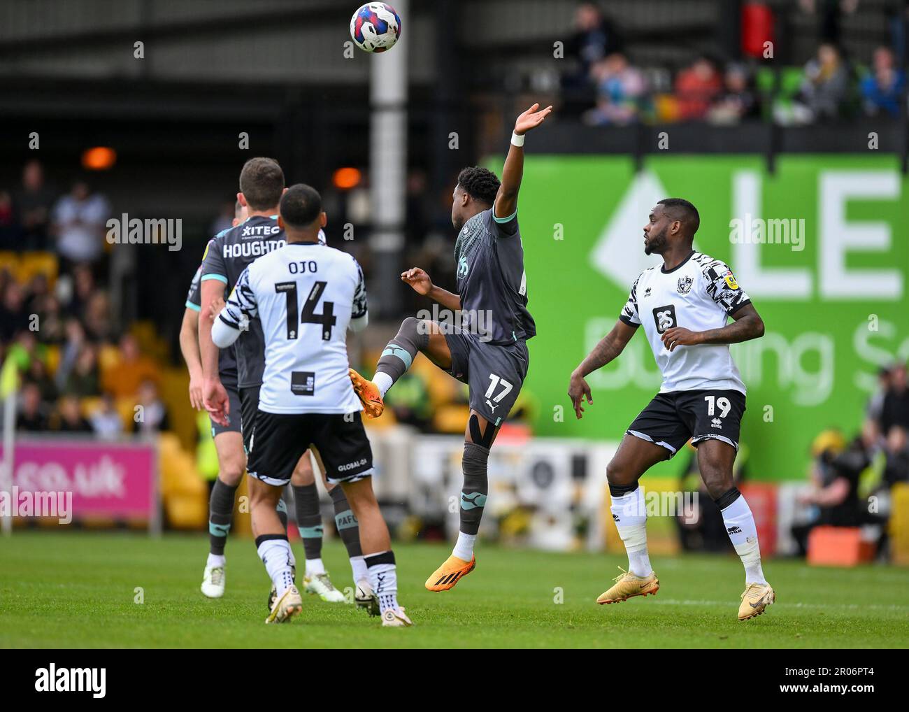 Bali Mumba #17 of Plymouth Argyle   battles in the air  during the Sky Bet League 1 match Port Vale vs Plymouth Argyle at Vale Park, Burslem, United Kingdom, 7th May 2023  (Photo by Stan Kasala/News Images) Stock Photo