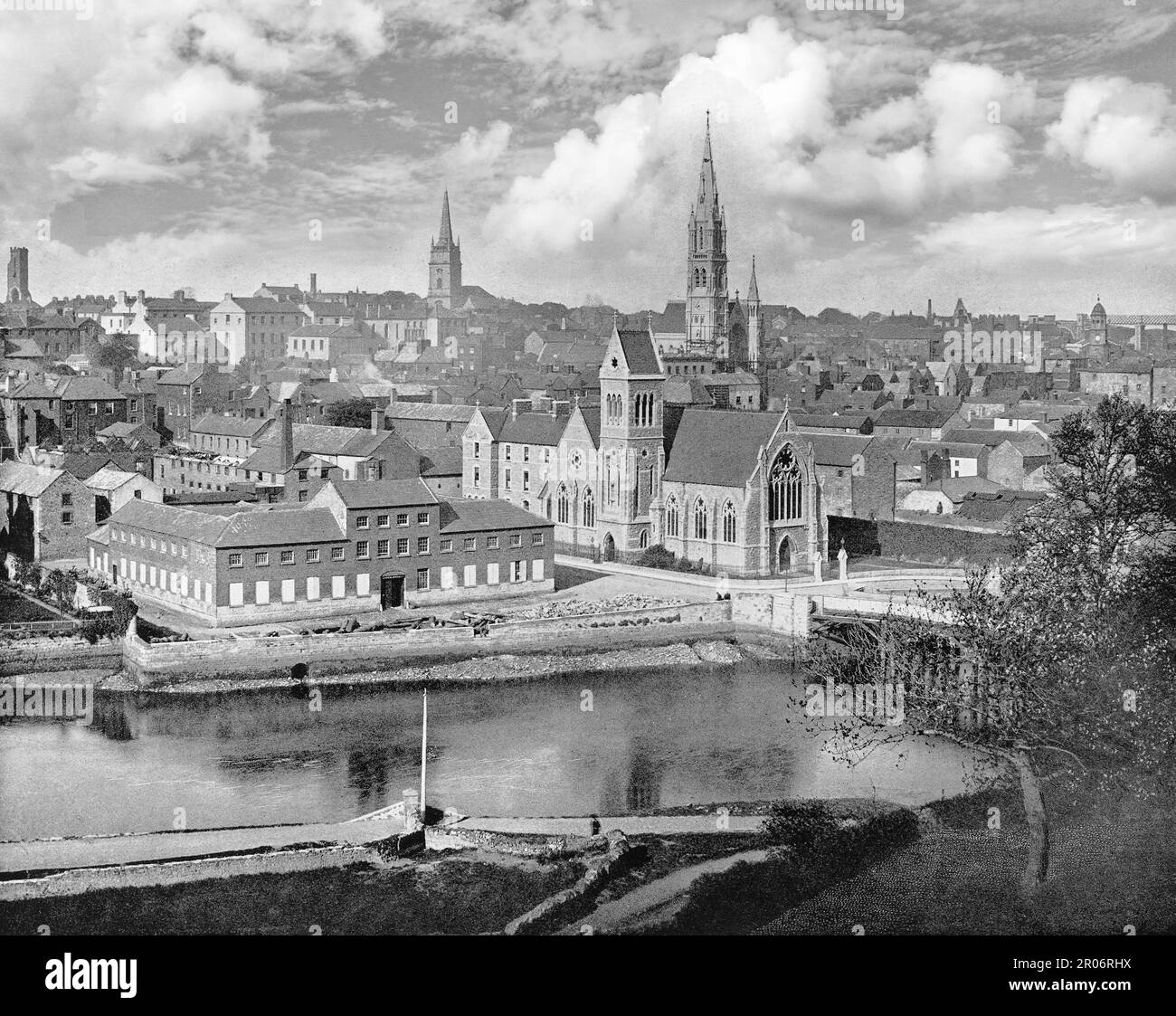 A late 19th century view of the northern bank of the River Boyne as it flows through Drogheda, in County Louth on the east coast of Ireland. The city was besieged by Oliver Cromwell's Parliamentarian forces in September 1649, at the outset of the Cromwellian conquest of Ireland, an event that resulted in a massacre. Stock Photo