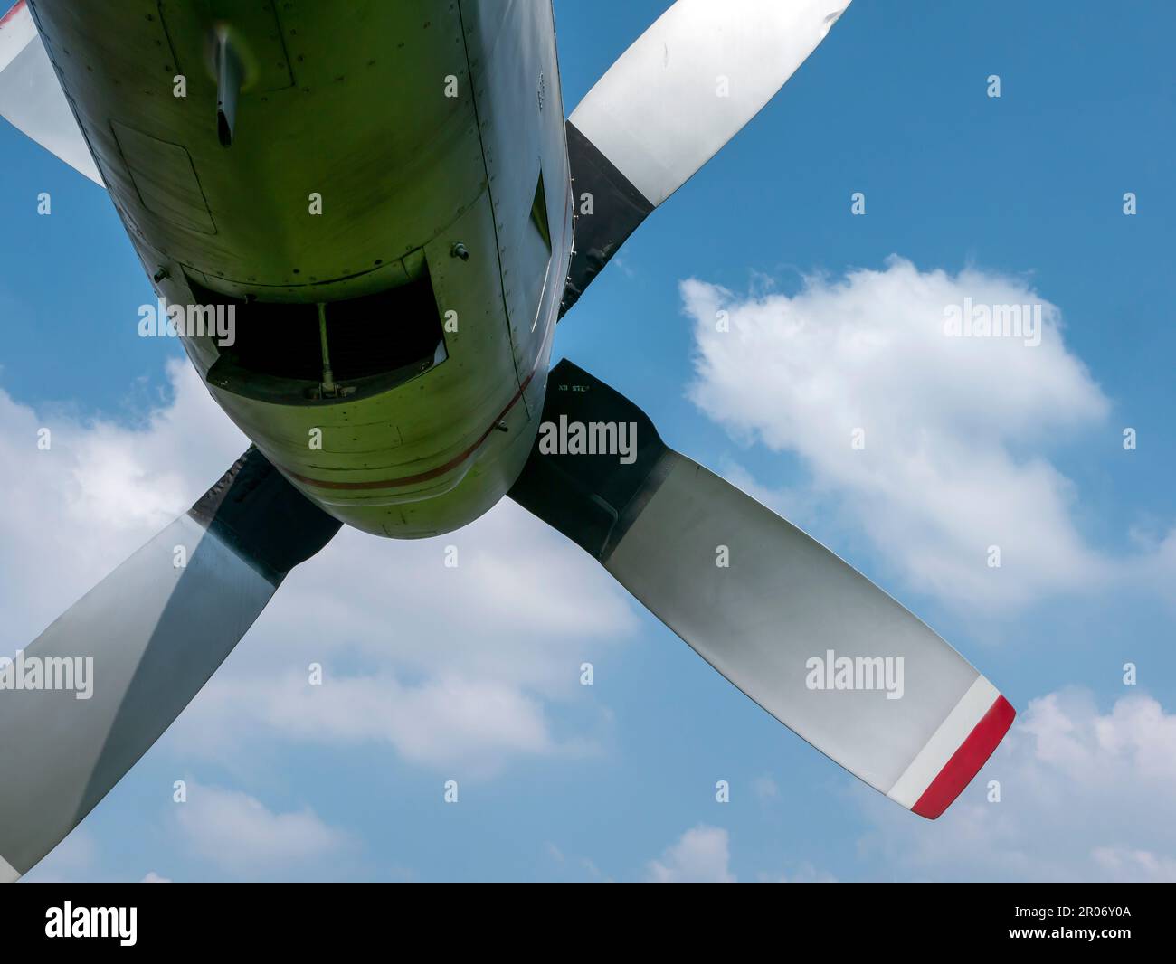 An old airplane propeller with blue sky background Stock Photo - Alamy