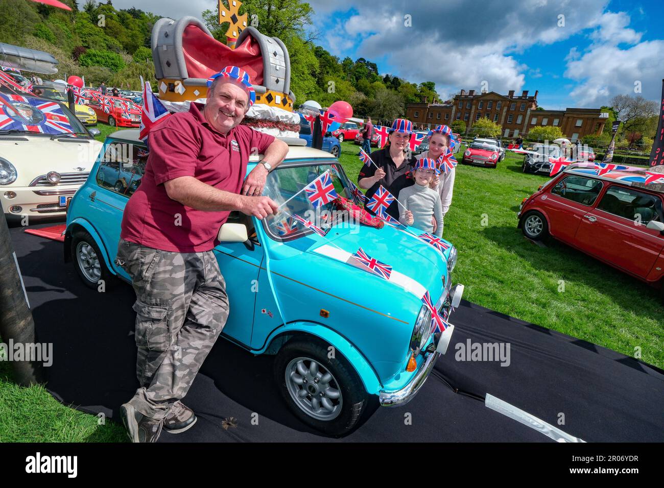 The British Mini Day was held at Himley Hall Nr Dudley, West Midlands, to celebrate the iconic Mini from 1959 to present day. This years show also saw the clib celebrate the Kings Coronation with patriotic themes and displays of Mini”s  past and present. There was also a Royal Mini Picnic in the Park.  Lr Ashley Fellows, Carly Male, Rebecca & Emilia from Midlands MINI Club   The venue, Himley Hall & Park is an 18th Century building set amongst 180 acres of ‘Capability Brown’ landscaped parkland. For over four centuries it served as home to the Lords of Dudley and their knights. On Sunday 7th M Stock Photo