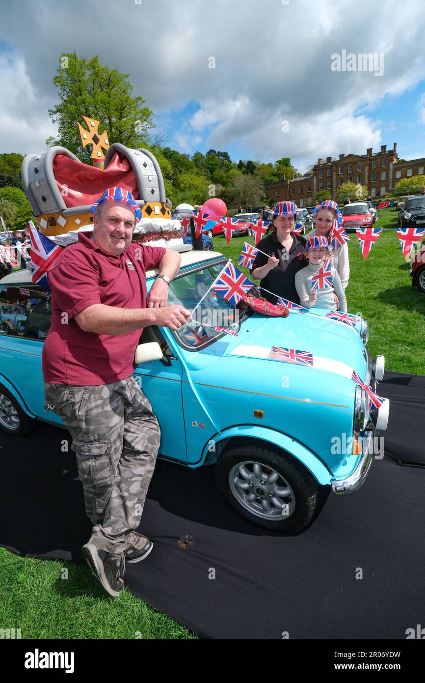 The British Mini Day was held at Himley Hall Nr Dudley, West Midlands, to celebrate the iconic Mini from 1959 to present day. This years show also saw the clib celebrate the Kings Coronation with patriotic themes and displays of Mini”s  past and present. There was also a Royal Mini Picnic in the Park.  Lr Ashley Fellows, Carly Male, Rebecca & Emilia from Midlands MINI Club   The venue, Himley Hall & Park is an 18th Century building set amongst 180 acres of ‘Capability Brown’ landscaped parkland. For over four centuries it served as home to the Lords of Dudley and their knights. On Sunday 7th M Stock Photo