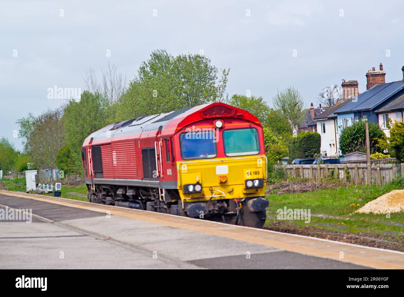 DB Shenker Class 66185 light engine at Eaglescliffe Railway station, Cleveland, England Stock Photo