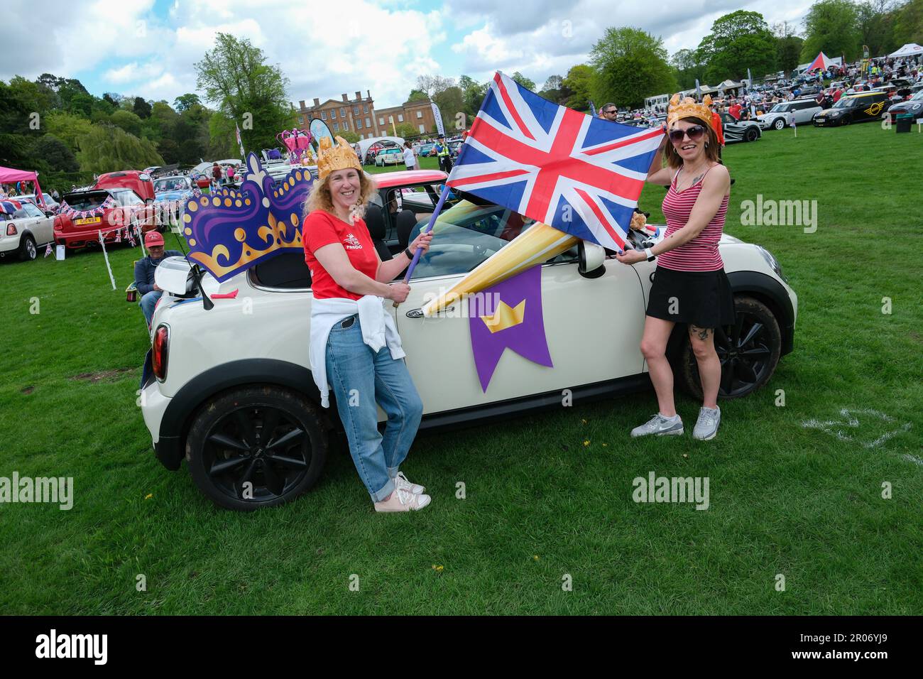 The British Mini Day was held at Himley Hall Nr Dudley, West Midlands, to celebrate the iconic Mini from 1959 to present day. This years show also saw the clib celebrate the Kings Coronation with patriotic themes and displays of Mini”s  past and present. There was also a Royal Mini Picnic in the Park.  Lr Caroline Curry & Francoise Lucas from the Mini Girls UK Club   The venue, Himley Hall & Park is an 18th Century building set amongst 180 acres of ‘Capability Brown’ landscaped parkland. For over four centuries it served as home to the Lords of Dudley and their knights. On Sunday 7th May was t Stock Photo