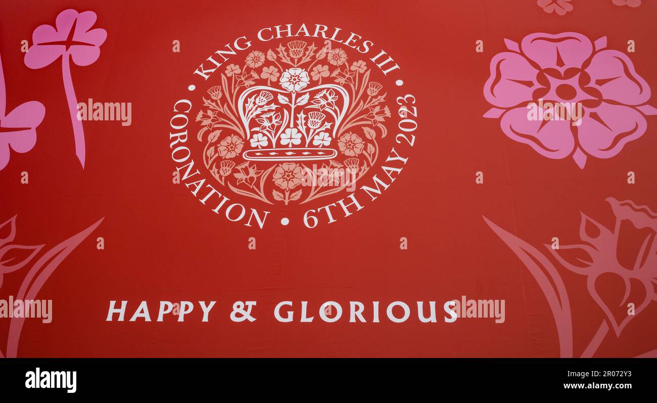 London's iconic National Gallery in Trafalgar Square adorned with a massive red hoarding in honour of the coronation of King Charles III. The towering Stock Photo