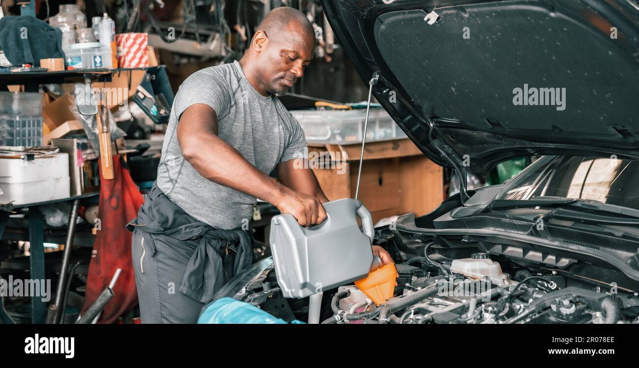 Auto mechanic diagnose and troubleshoots with tools and equipment