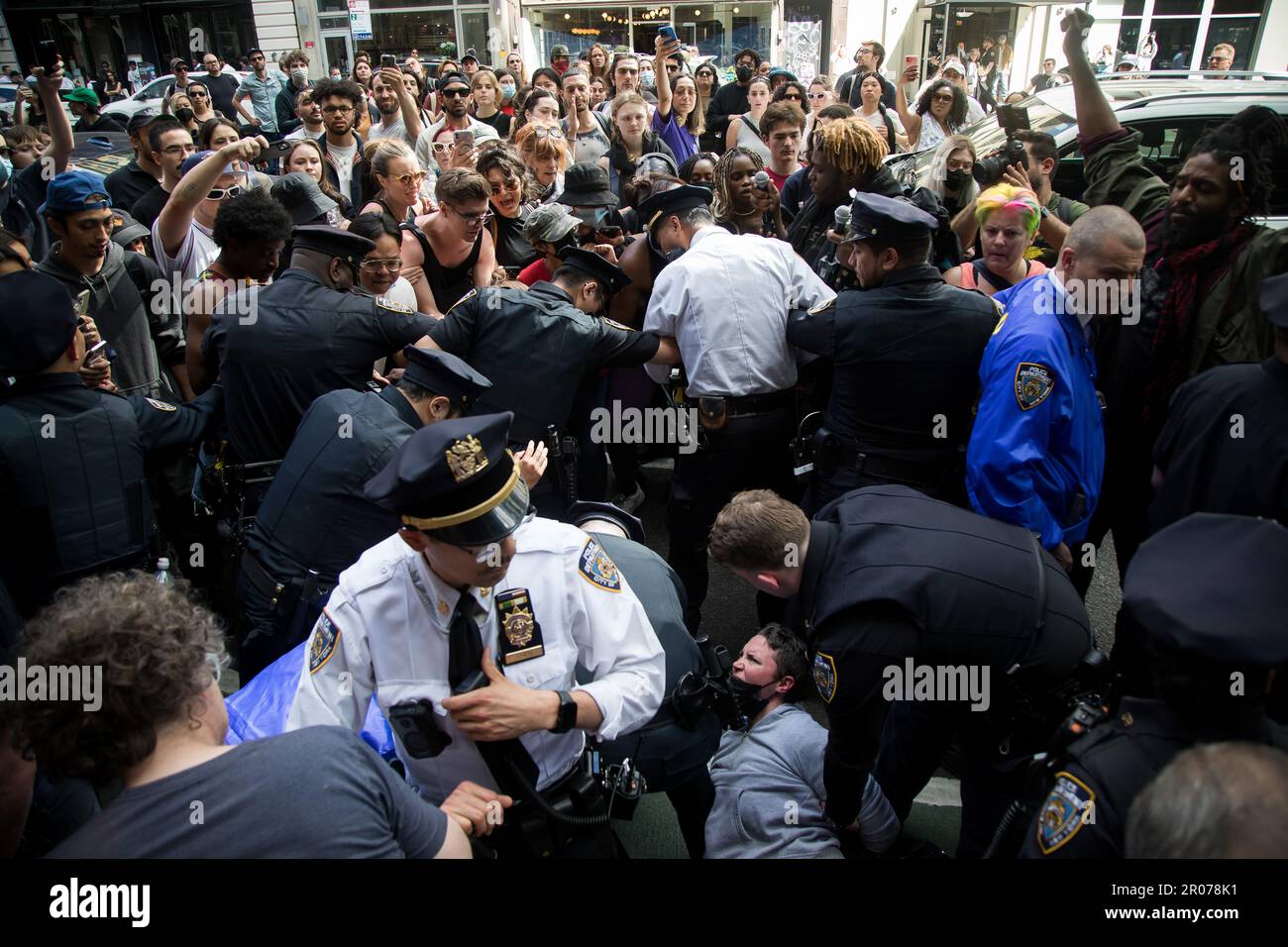 New York, USA. 6th May, 2023. Police officers clash with protesters