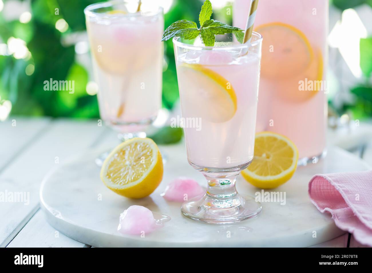 Frosty refreshing glasses of sweet lemonade, ready for drinking. Stock Photo