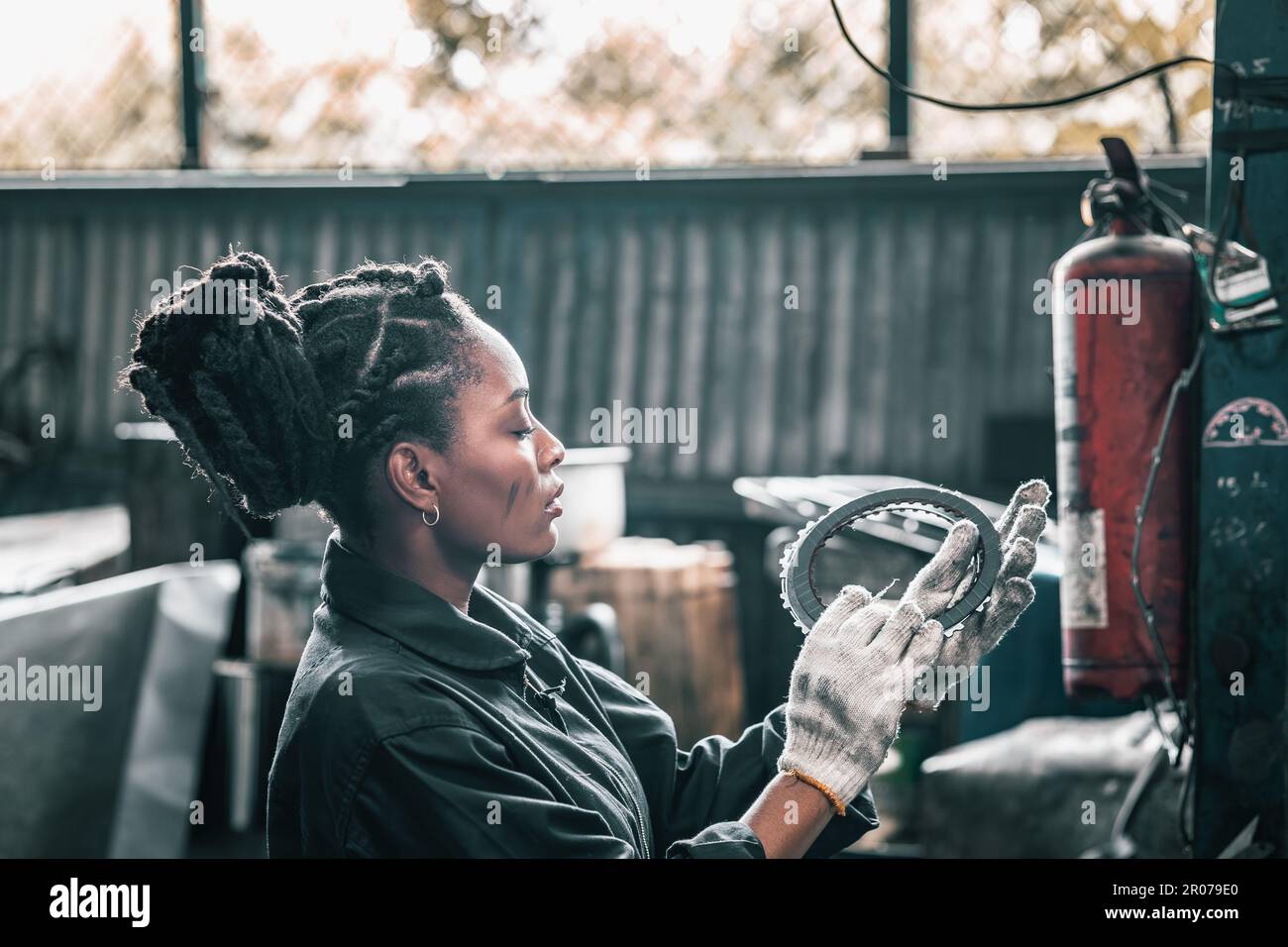 Auto mechanic diagnose and troubleshoots with tools and equipment