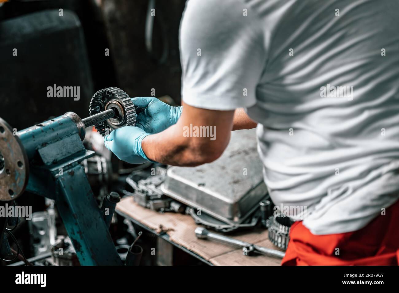 Auto mechanic diagnose and troubleshoots with tools and equipment
