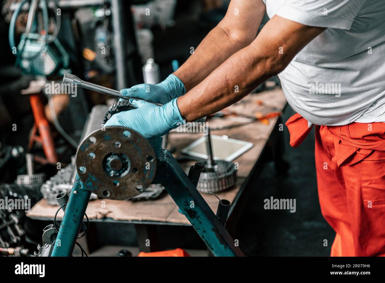 Auto mechanic diagnose and troubleshoots with tools and equipment