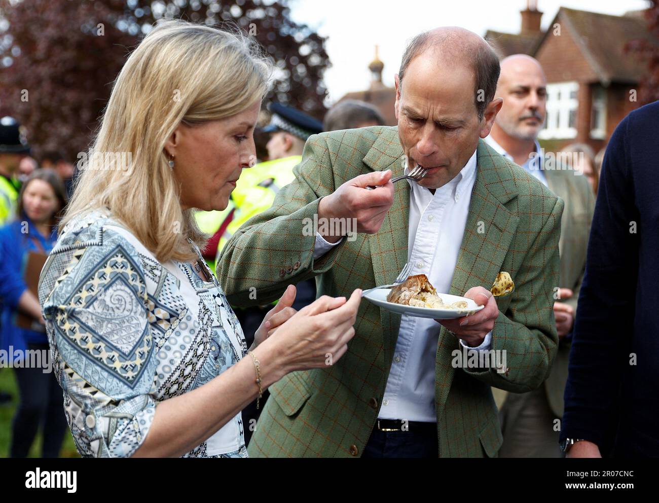 The Duke of Edinburgh and the Duchess of Edinburgh taste a coronation chicken pie as they attend a Big Lunch with residents and representatives from the Royal British Legion, the Scouts and the Guides, in Cranleigh, Surrey. Thousands of people across the country are celebrating the Coronation Big Lunch on Sunday to mark the crowning of King Charles III and Queen Camilla. Picture date: Sunday May 7, 2023. Stock Photo