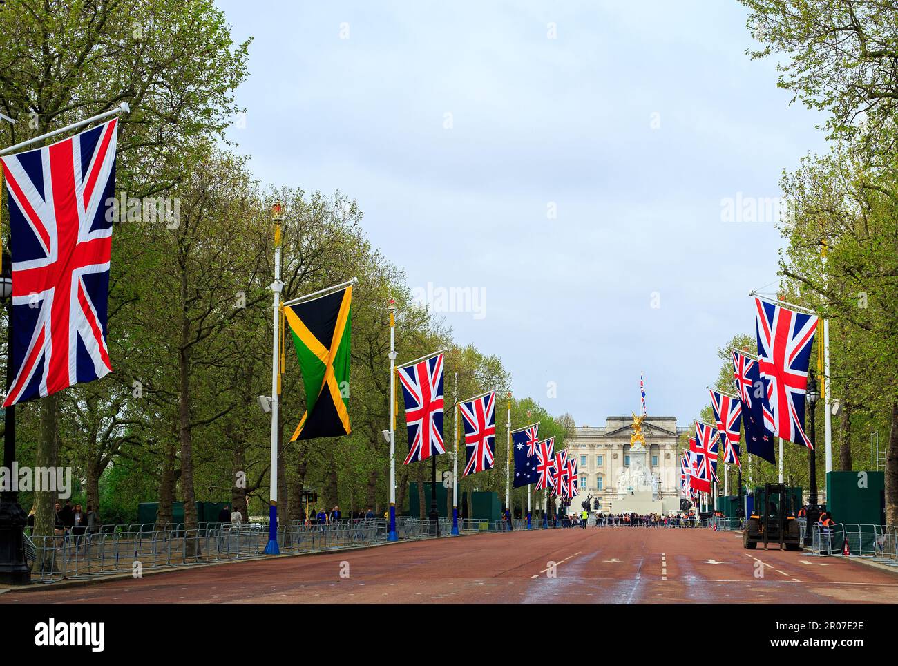 The Mall looking towards Buckingham Palace with Union Jack and Commonwealth Country flags lining the route to the palace. Stock Photo