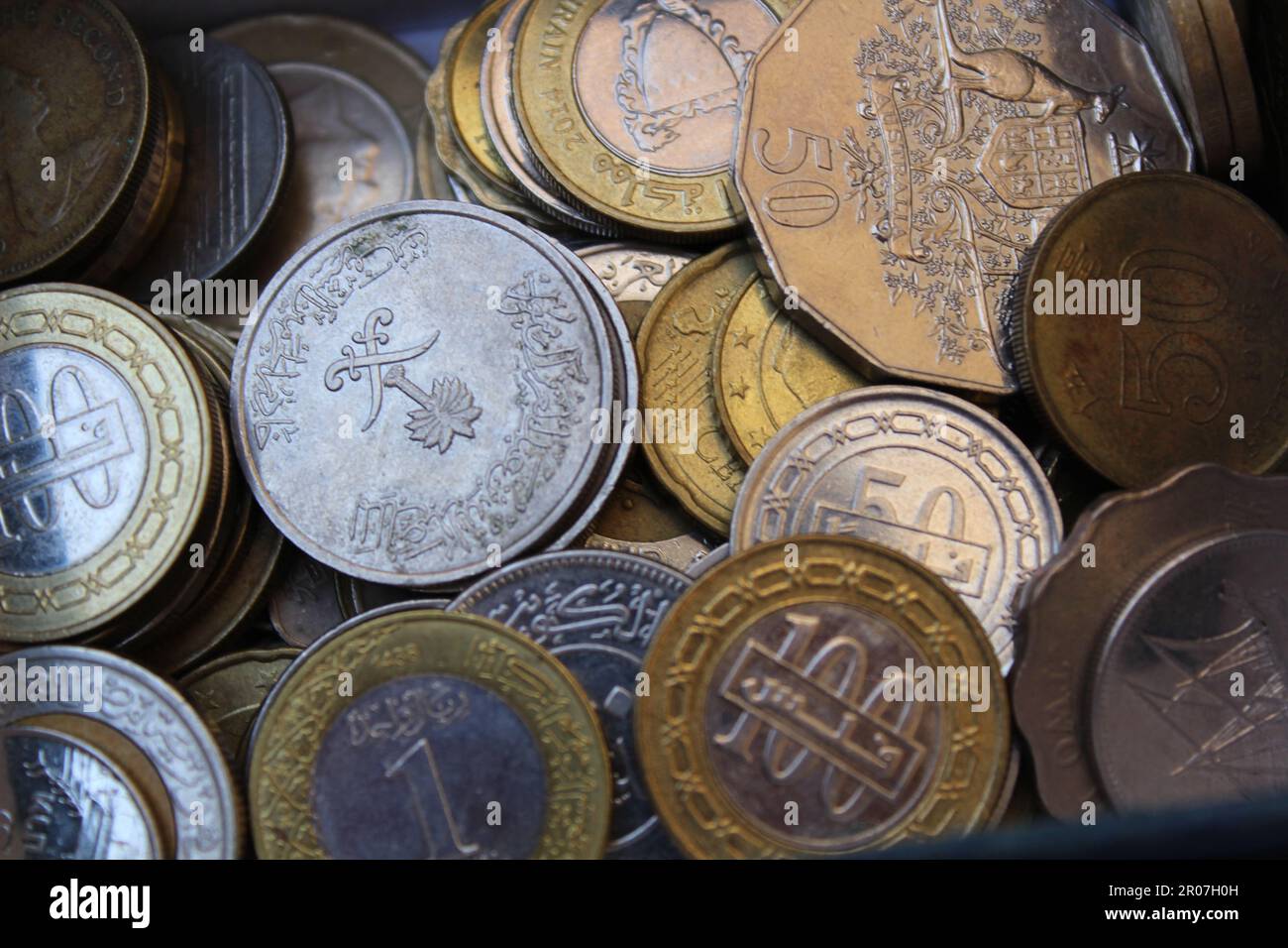 Close up of a collection of different coins set from countries around ...