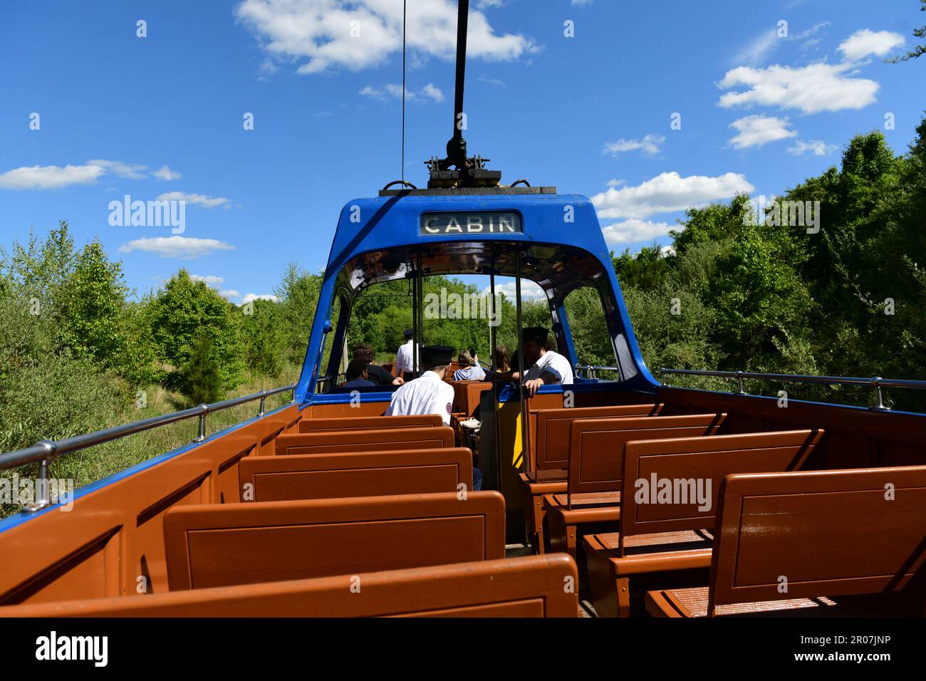 USA Maryland Colesville Montgomery County National Capital Trolley Museum - street car tram passengers on a boat tram Stock Photo