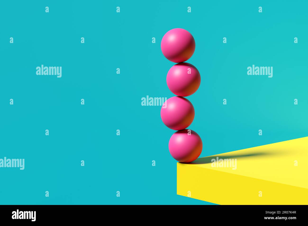 Balance and equilibrium. Risk, insecurity, uncertainty and crisis management. Pink sphere balls standing balanced at the edge of a yellow table. 3D re Stock Photo