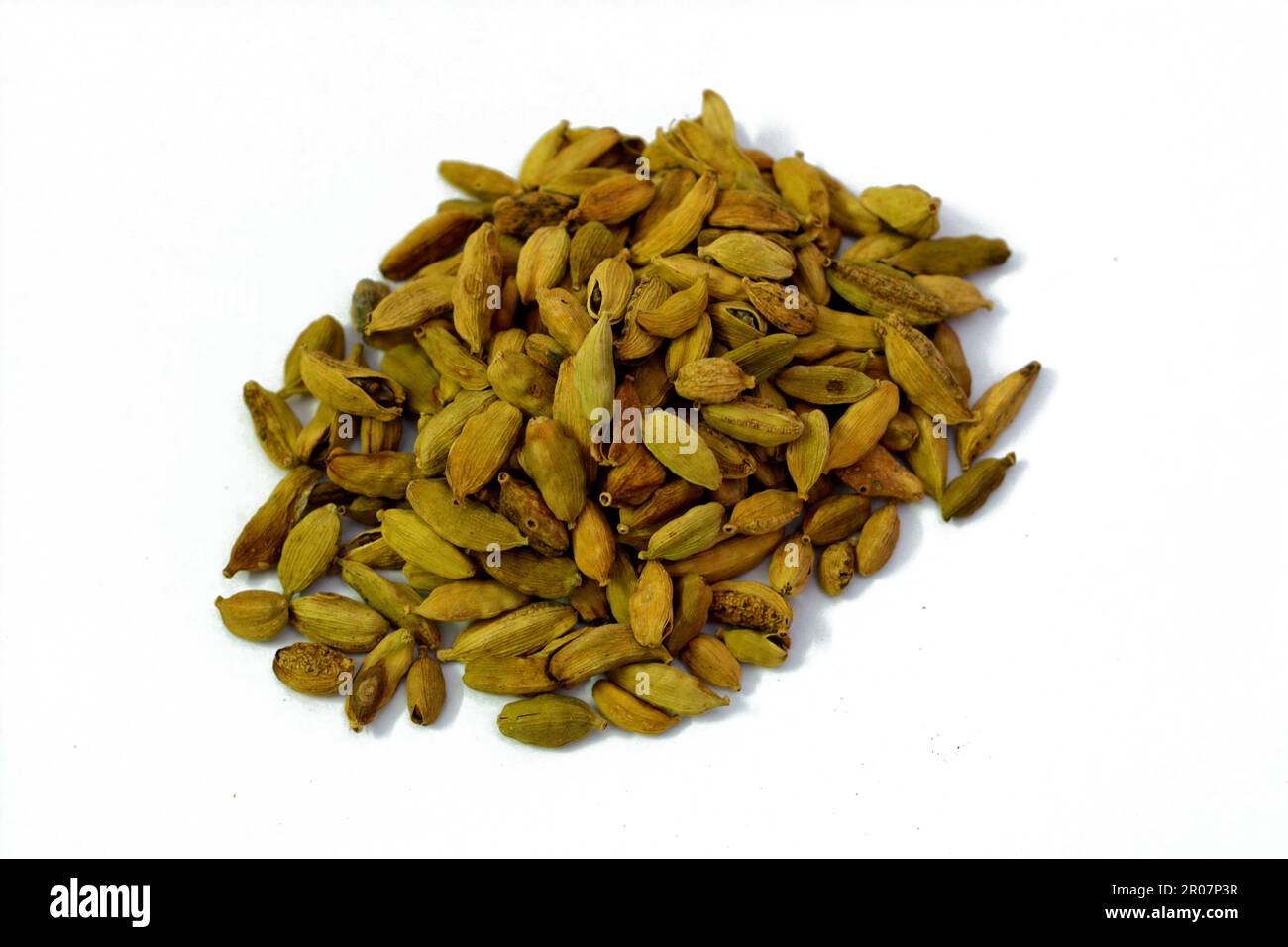 Cardamom, cardamon or cardamum, a spice made from the seeds of several plants in the genera Elettaria and Amomum in the family Zingiberaceae, used in Stock Photo