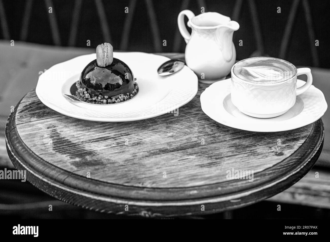 Coffee or coffe cup at cafe in the morning. Loving coffee. Cup of fresh cappuccino. Chocolate cake. Closeup. Tasty chocolate cake. Black and white Stock Photo