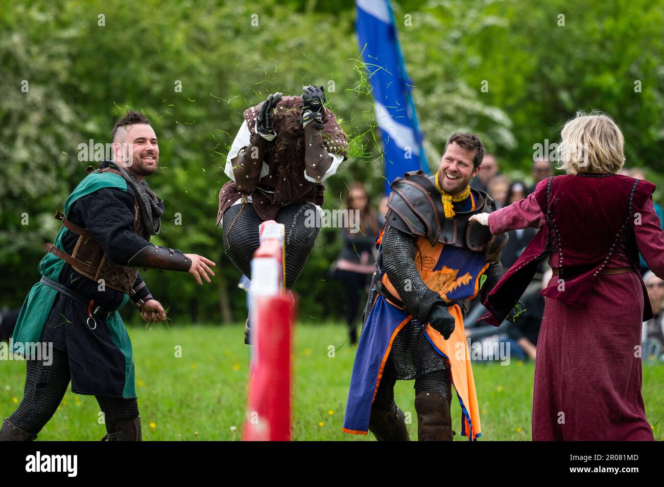 Knight Getting Coronated Chalfont, UK. 7 May 2023. Re enactors as armoured knights give a grassy ...