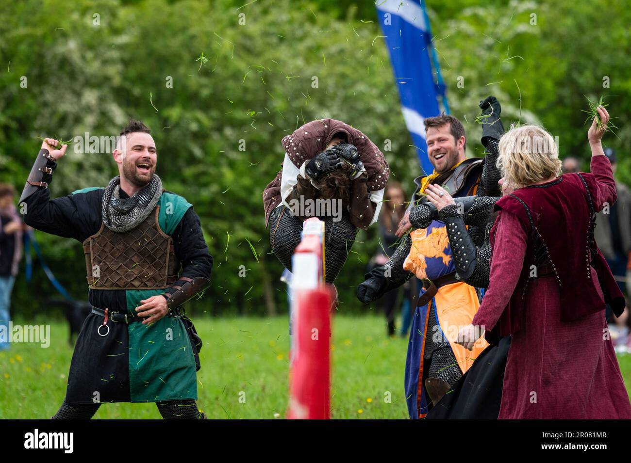 Knight Getting Coronated Chalfont, UK. 7 May 2023. Re enactors as armoured knights give a grassy ...