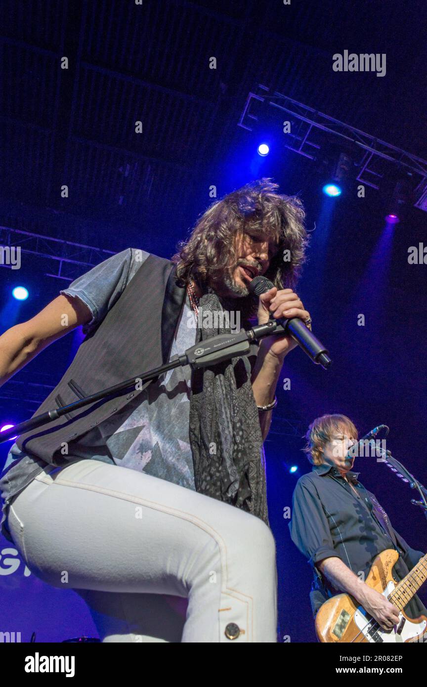 12 April, 2015, Las Vegas, Nevada: Vocalist Kelly Hansen (left) and bassist Jeff Pilsen perform with Foreigner at a corporate show. Stock Photo