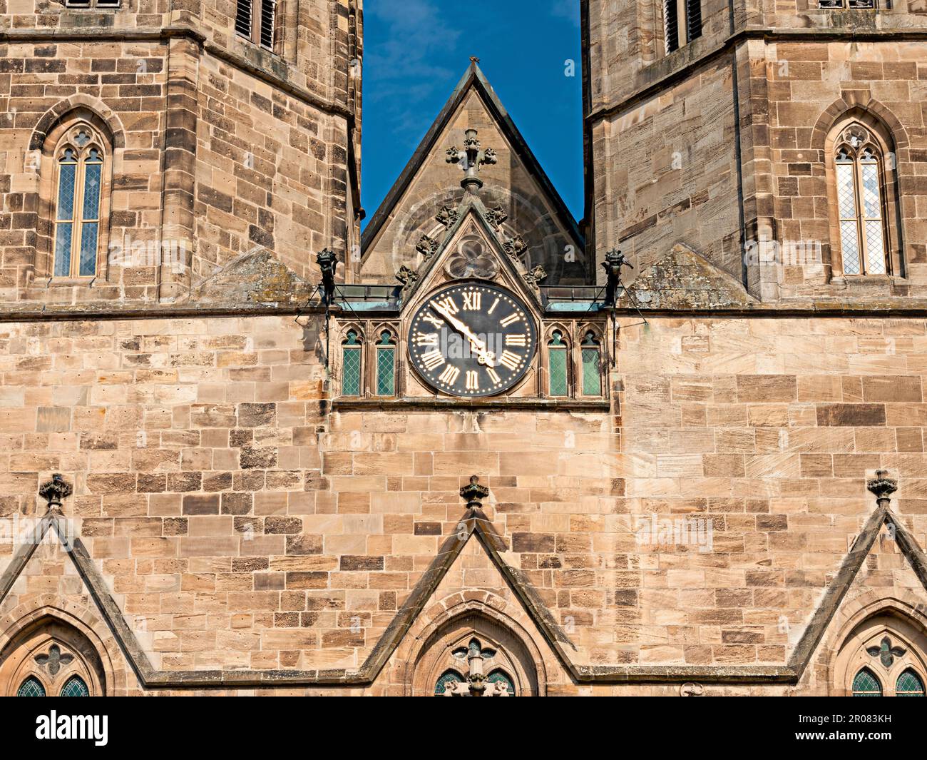Detail of the portal with tower clock of the Basilica St. Cyriakus in Duderstadt, Germany Stock Photo