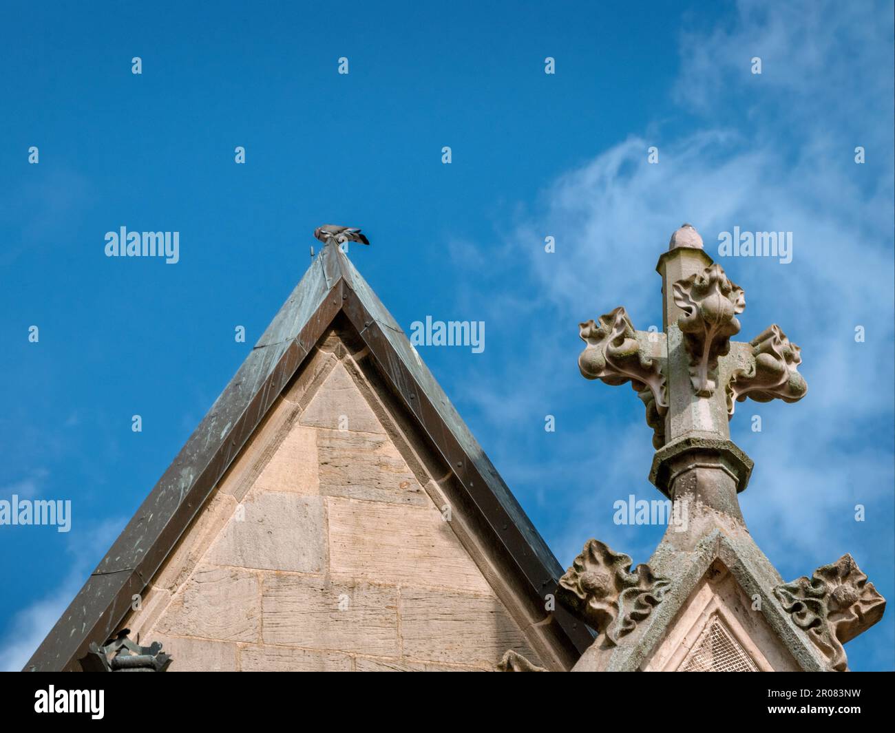 Detail of the pediment with ornaments of the Basilica of St. Cyriakus in Duderstadt, Germany. Stock Photo