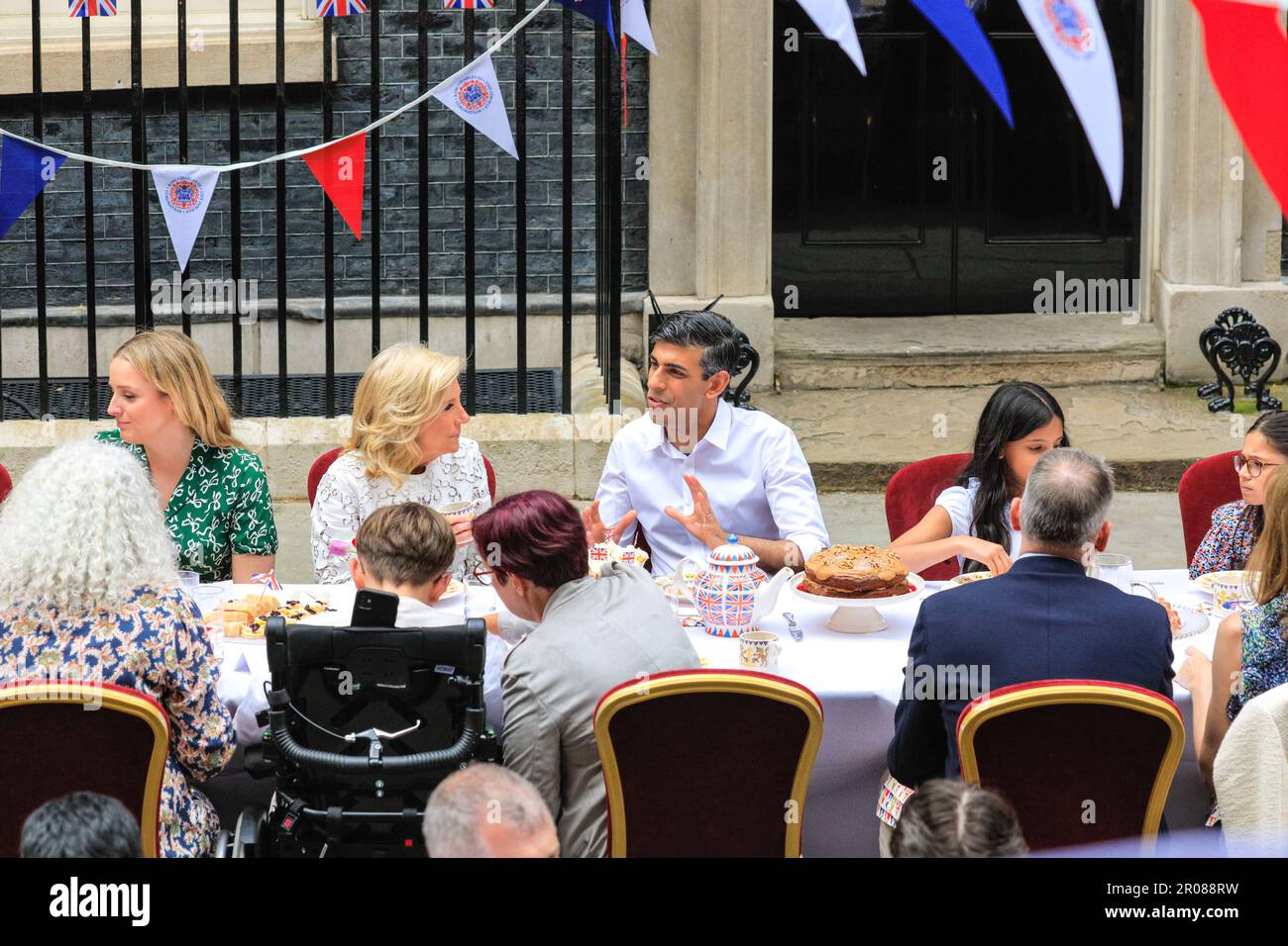 London, UK. 07th May, 2023. British Prime Minister Rishi Sunak, his wife Akshata Murty, daughters Krishna and Anoushka and Labrador Nova host a Coronation Big Lunch in Downing Street, with special guests Dr. Jill Biden, the US First Lady, and her granddaughter Finnegan, in attendance. Community heroes, Ukrainian families, recipients of the Points of Light Award, youth groups and others gather in Downing Street today for a special Coronation lunch. Credit: Imageplotter/Alamy Live News Stock Photo