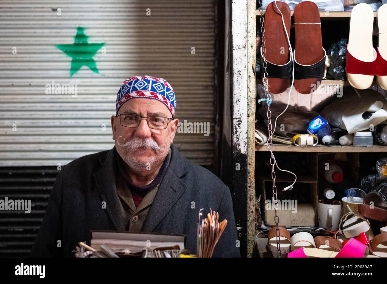 Damascus, Syria - april, 2023: Portrait of a Syrian Vendor at Souq Al Hamidiyah, in front of his Shop in Damascus, Syria. Stock Photo