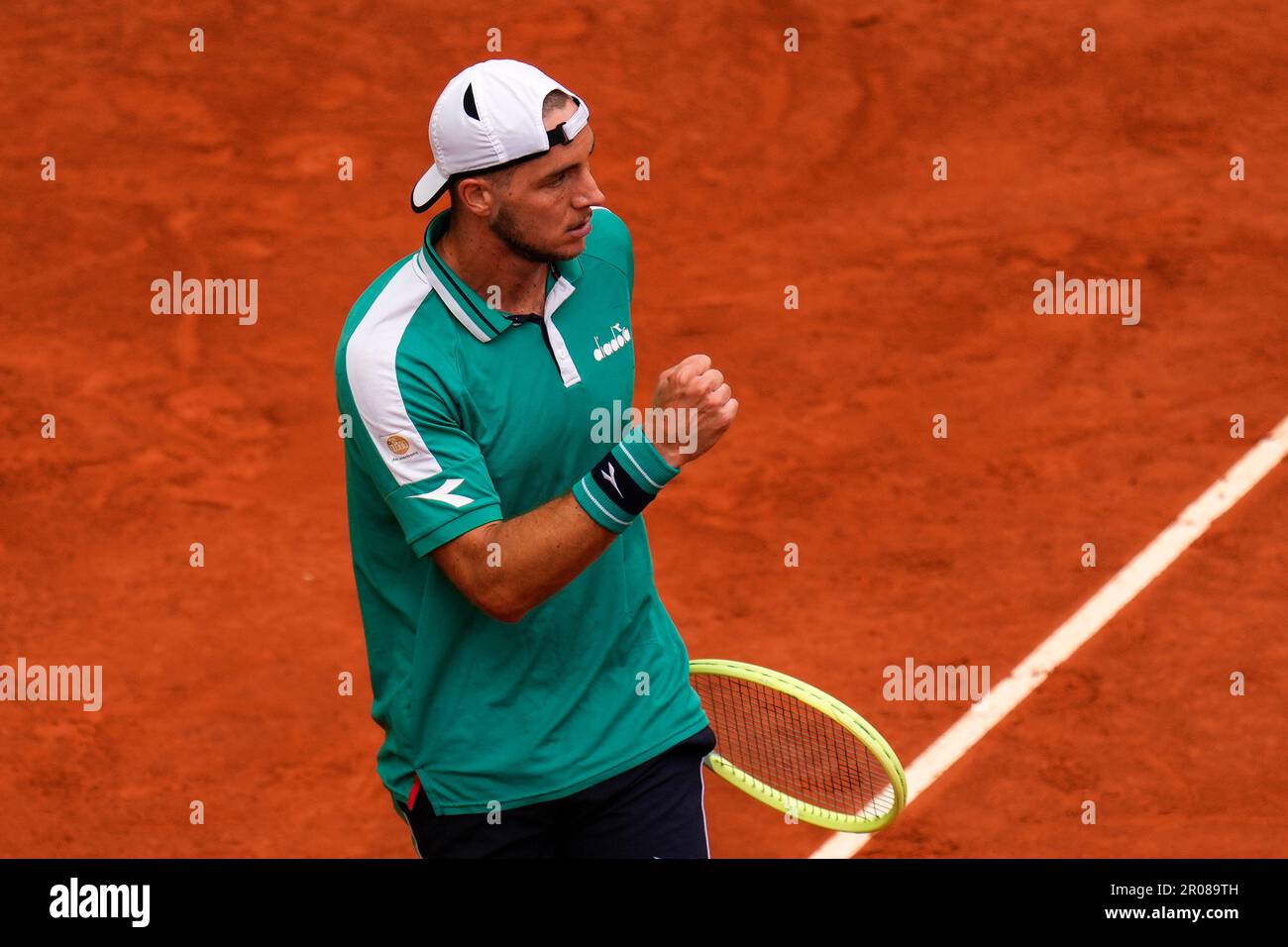 Jan-Lennard Struff, of Germany, celebrates a point during his match against Carlos Alcaraz, of Spain, during their mens singles final match at the Madrid Open tennis tournament in Madrid, Spain, Sunday, May