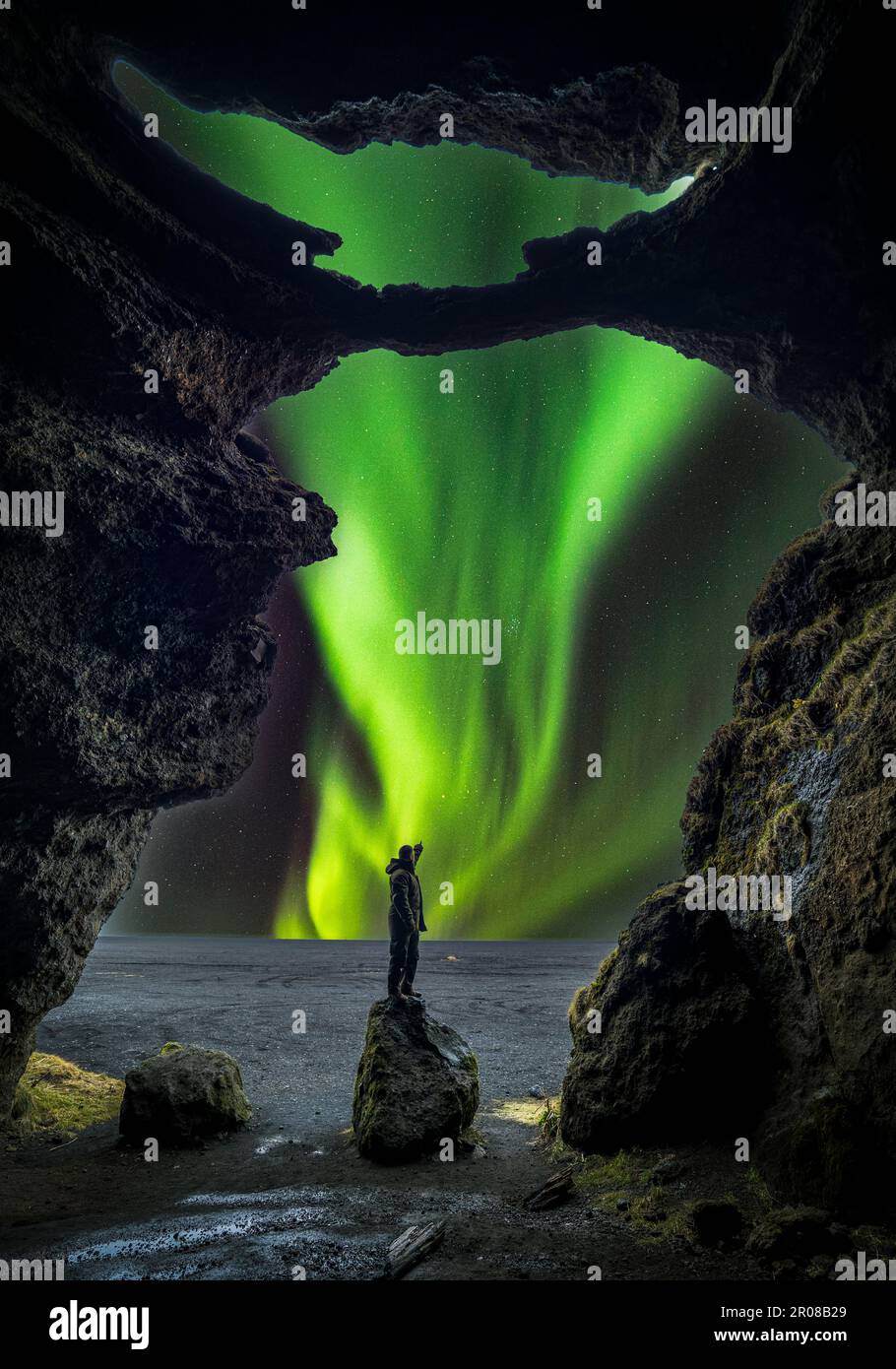 Yoda Cave in Iceland with Northern Lights Stock Photo