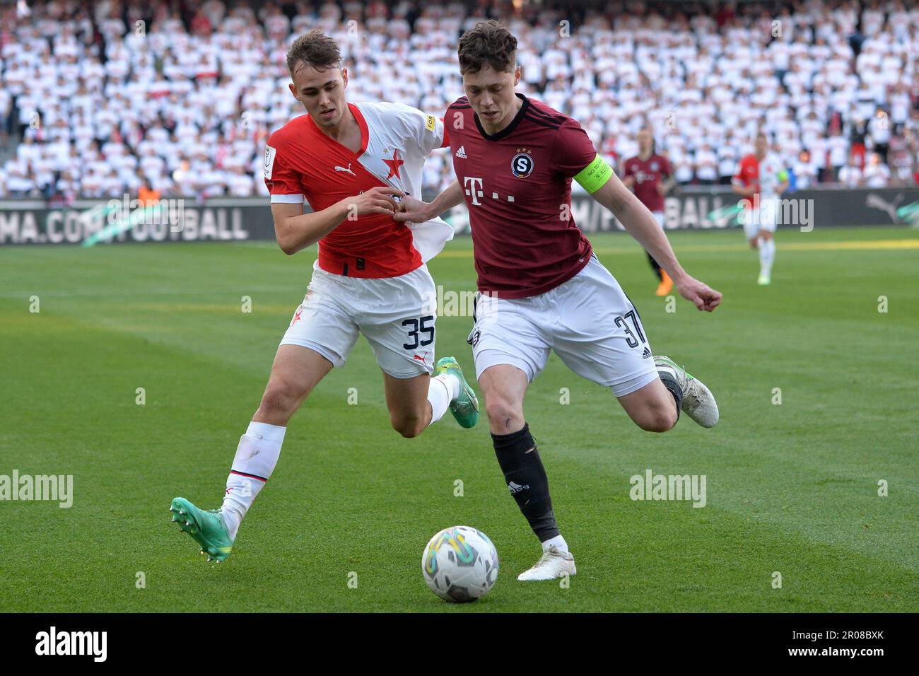 Prague, Czech Republic. 3rd May, 2023. OSCAR DORLEY of Slavia Praha fights  for the ball with Sparta's ADAM KARABEC (L) during Czech Cup of 2022-2023  at May 03, 2023, in Prague as