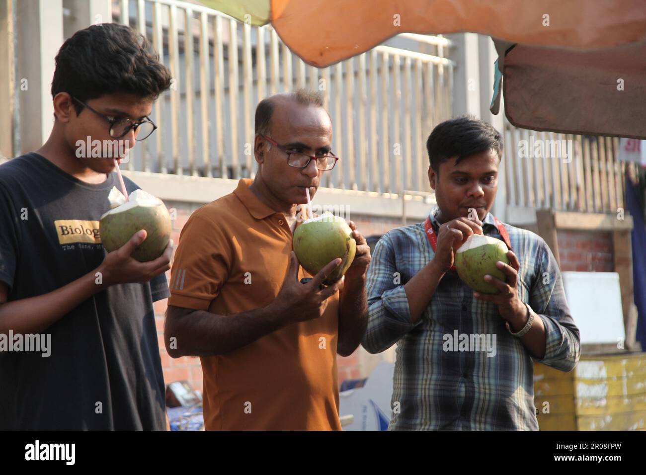 Coconut water in summer.07may,2023 dhaka bangladesh.Coconut water is considered as natural